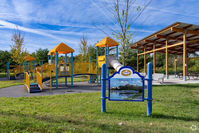 Residents of Berkeley enjoy the play area and covered picnic tables of Ramona-Mathison Lake Park