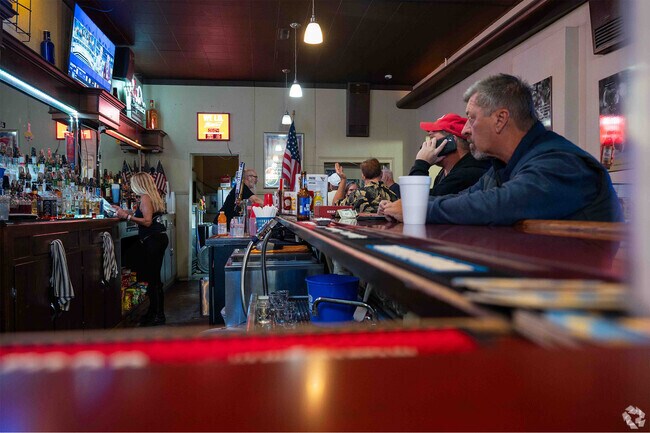 People enjoying a drink at the 5th Street Billiards Bar & Grill in nearby Dupo, IL.
