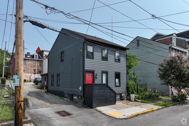 Some American Foursquares in Central Northside have a modern look to them.