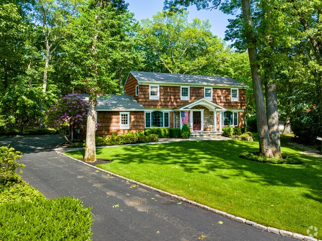 Homes with attached garages and large yards are a popular housing option in Nissequogue.