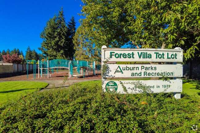 Take the kids to play at the Forest Villa Tot Lot in the Plateau neighborhood.