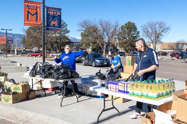 The community gets together to feed the needy in the Knob Hill neighborhood.