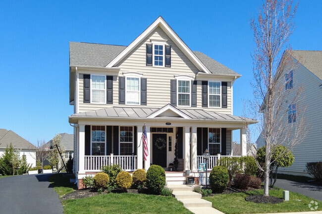 A beautiful Colonial home flies the stars and stripes in Loudoun Valley Estates.