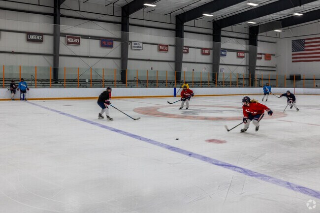 The local girls team gets in some practice at Thayer Sports Academy in South Braintree.