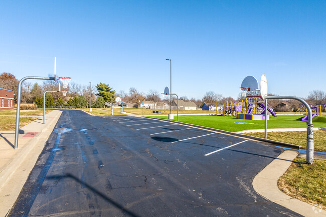 Students at Belmont love basketball during recess.
