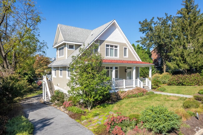 Many homes in Kennett Square have large front porches, perfect for enjoying a sunny day.