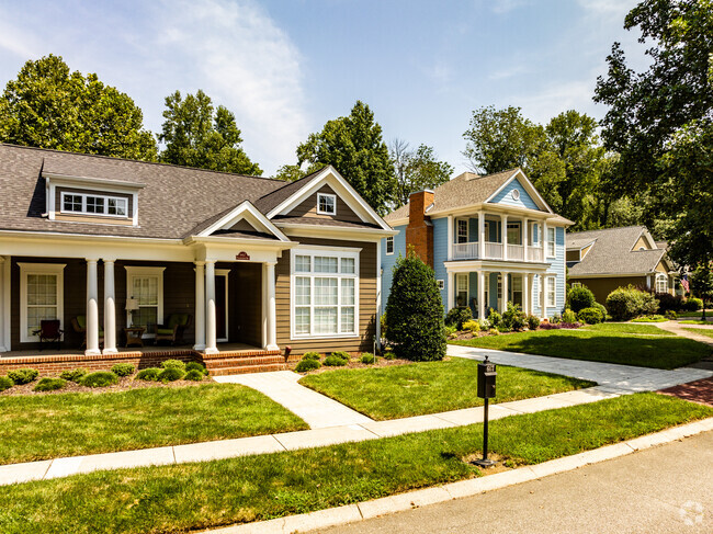 A pair of Greek revival homes in the Falling Waters neighborhood