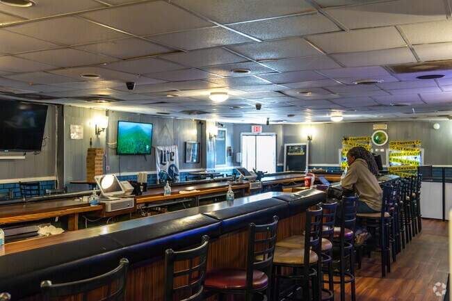 Leroy’s Lounge is known for relaxed bartenders, music, and budget-friendly pours.
