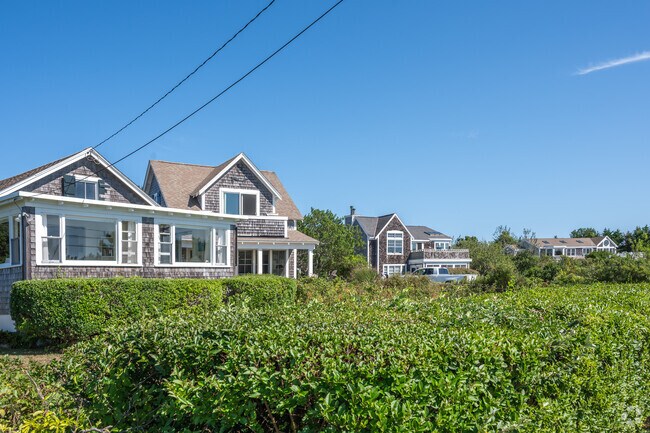 Tall hedges separate many homes in Truro.