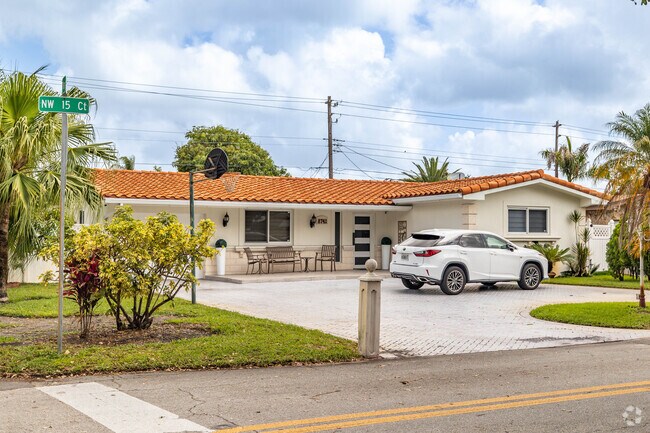 Well-maintained ranch-style homes line West Boulevard Heights in Pembroke Pines, Florida.