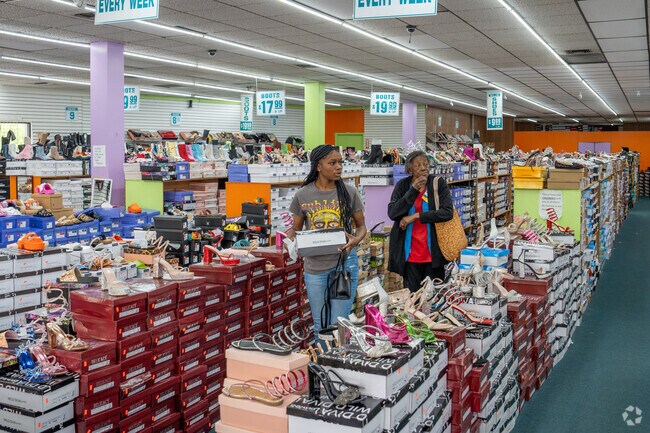 Find a pair of shoes at Shoe Time near Oakwood Place.