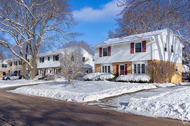 Colonial‑style homes line a quiet street in Glen Port.