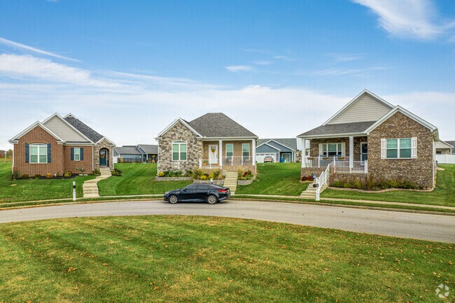 Traditional-style brick homes are prevalent in Villages of Falls Creek.