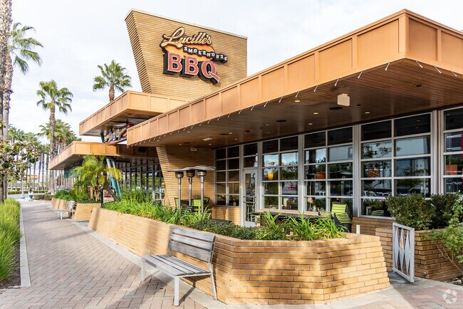 Savor the flavor at Lucille's Smokehouse Bar-B-Que.