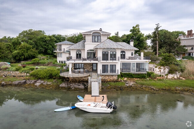 Private docks and panoramic water views define Cohasset’s premier properties.