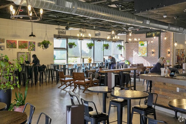 The interior of Lost Shoe Brewing has different styles of seating with plenty of sunlight.