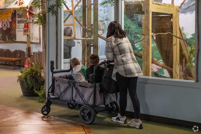 Families visit the zoo and gardens at Oglebay Park.