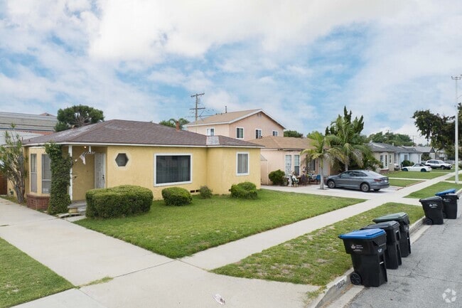 A row of single-family homes lines a street in Studebaker, Norwalk, CA.