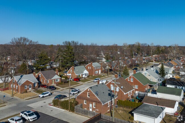 A row of brick homes along Telegraph Road.