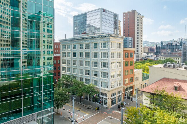 Beautifully designed buildings near Market Square in Pittsburgh have wall art that stands out.