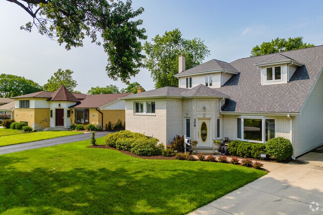 Some Hatlen Heights homes feature unique modern styles with spacious yards.