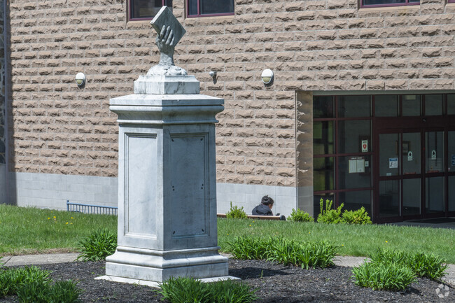 The Cumberland Public Library serves Valley Falls and is located on the site of the old monastery.