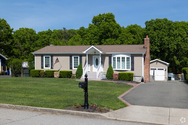 People have made their ranch style homes in Holtsville their own with personal touches.