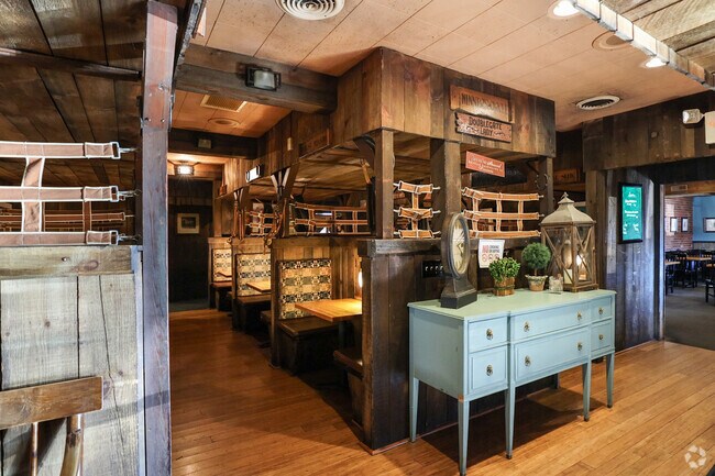 Bowie’s Rip’s restaurant has a rustic charm with intimate wood lined booths and is just a few minute drive from Enfield Chase.