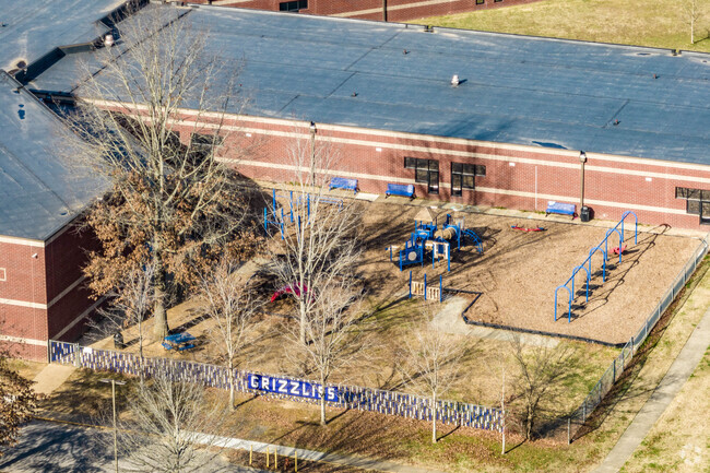 Kids are encouraged to run around and explore the play area at Walnut Grove Elementary School.