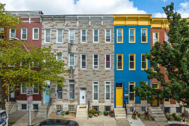 Three story row homes are common in Sandtown-Winchester.