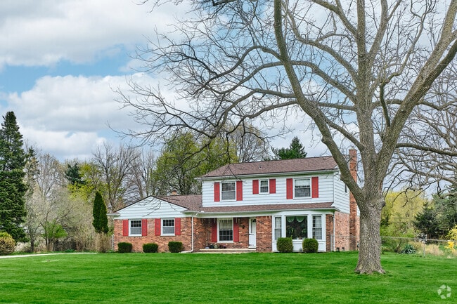 Many of the lots in Abbot feature towering trees shading wide front lawns.