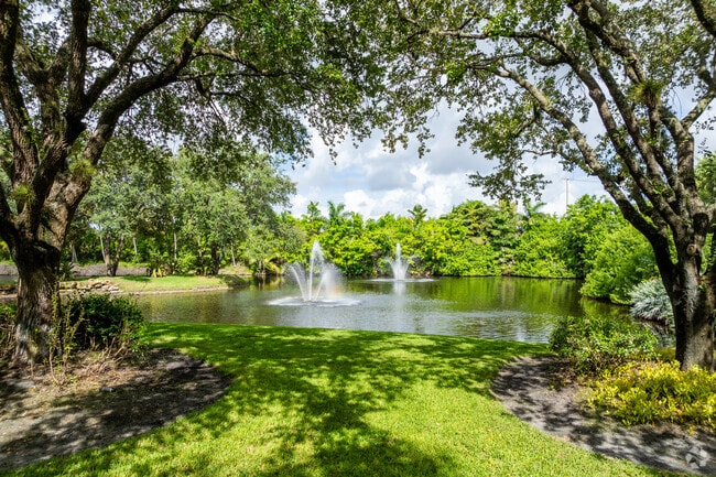 Boca Grove is surrounded by lush vegetation and meticulously kept landscaping.