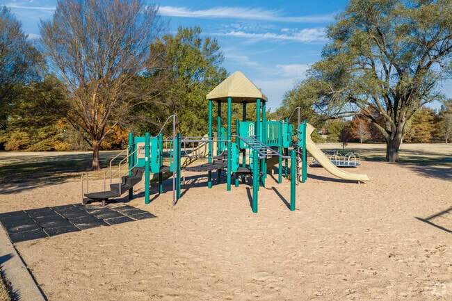 Kids can climb on the playground at Cypress Park in Village, Wichita.
