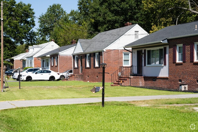 The neighborhood of Piney Knolls is known for its comfortable homes and well manicured lawns.