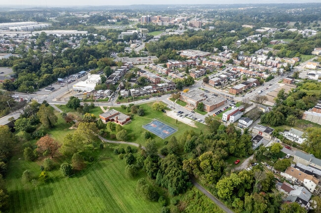 Lower Gwynns Falls Park is a large green space with a wide creek, basketball and baseball.