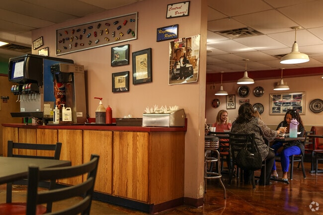 Swing by Oklahoma Style Bar-B-Que in Xyler, perfect for a laid-back lunch or grabbing smoky, delicious BBQ to go.
