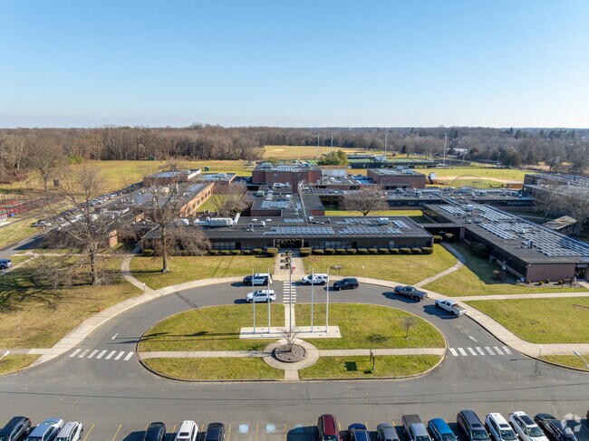 Monmouth Regional High School is surrounded by trees and nature.