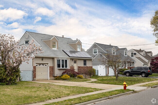 Rows of Cape Cods line the streets of South Farmingdale, NY.