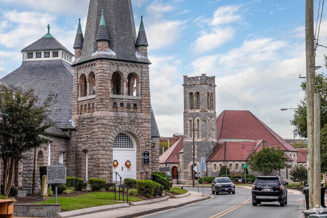 Beautiful church towers line Division Street as you enter Newtown-North Division.