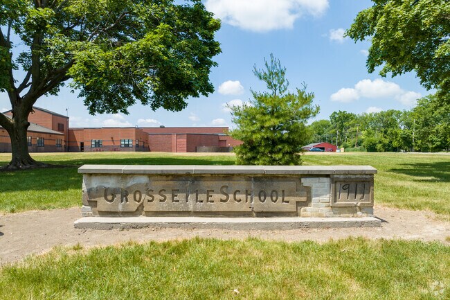 Grosse Ilse School  maintains its 1911 original sign.