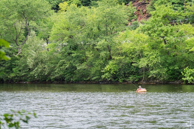 Locals enjoy the serene ambience of the Lehigh River.