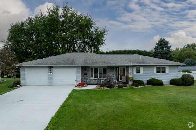 Midcentury ranch-style home with garage sits outside Caledonia’s town center.