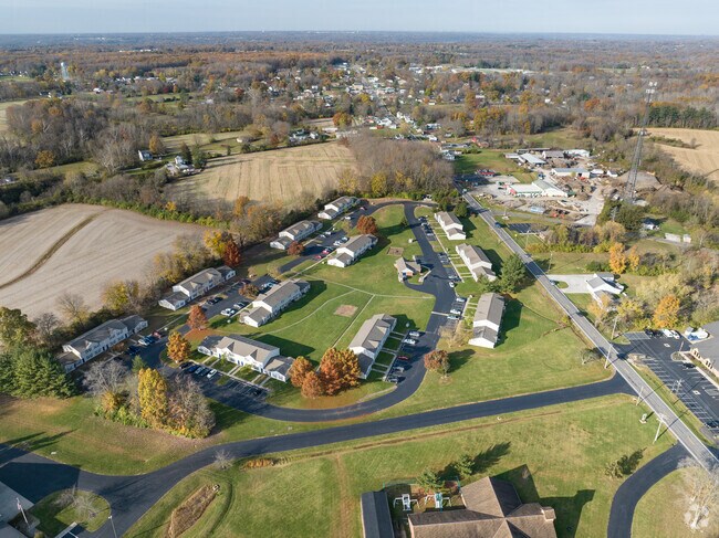 A portion of the Owensville community showcases tree-lined streets and residential homes.