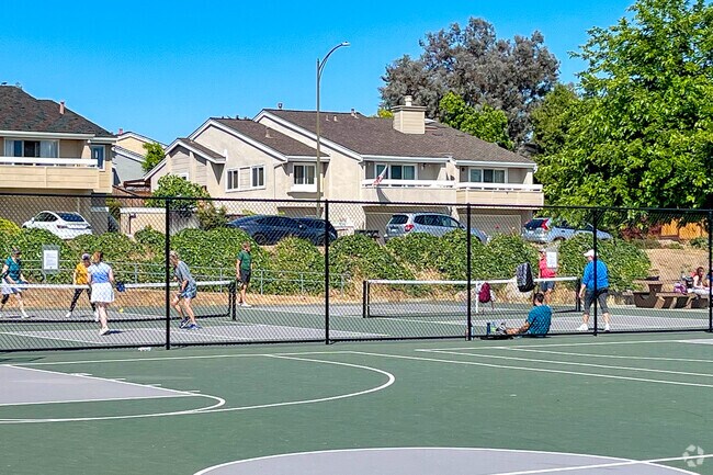 Kooser residents enjoy racquetball in Lone Hill Park.