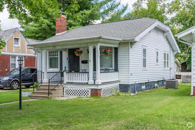 Beautiful flowers hang from bungalow porches in Johns Hill.