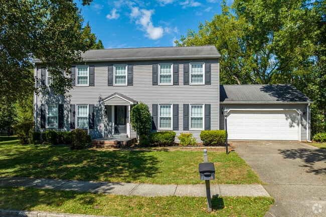 Large homes with attached garages are common in the Colonial Park neighborhood.