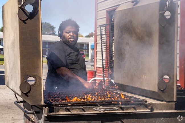 On warm days, residents of Von Steuben line up for roadside barbecue.