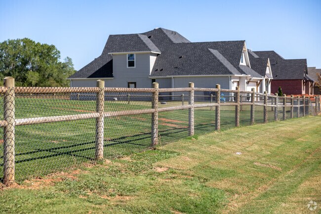 Some Navina homes feature wooden fences with mesh accents.