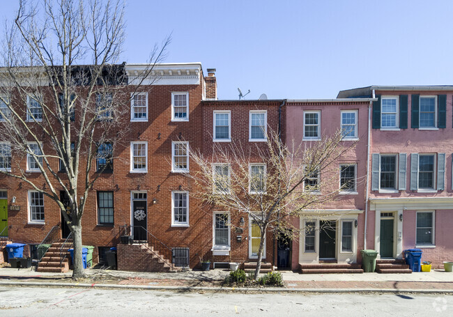More brightly colored row homes in Otterbein show of residents' quirky personalities.