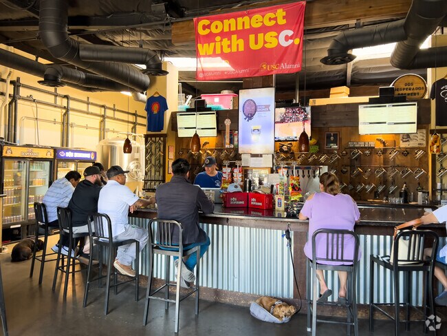 Local enjoy a craft beer at Dos Desperados Brewery in Palomar Estates.